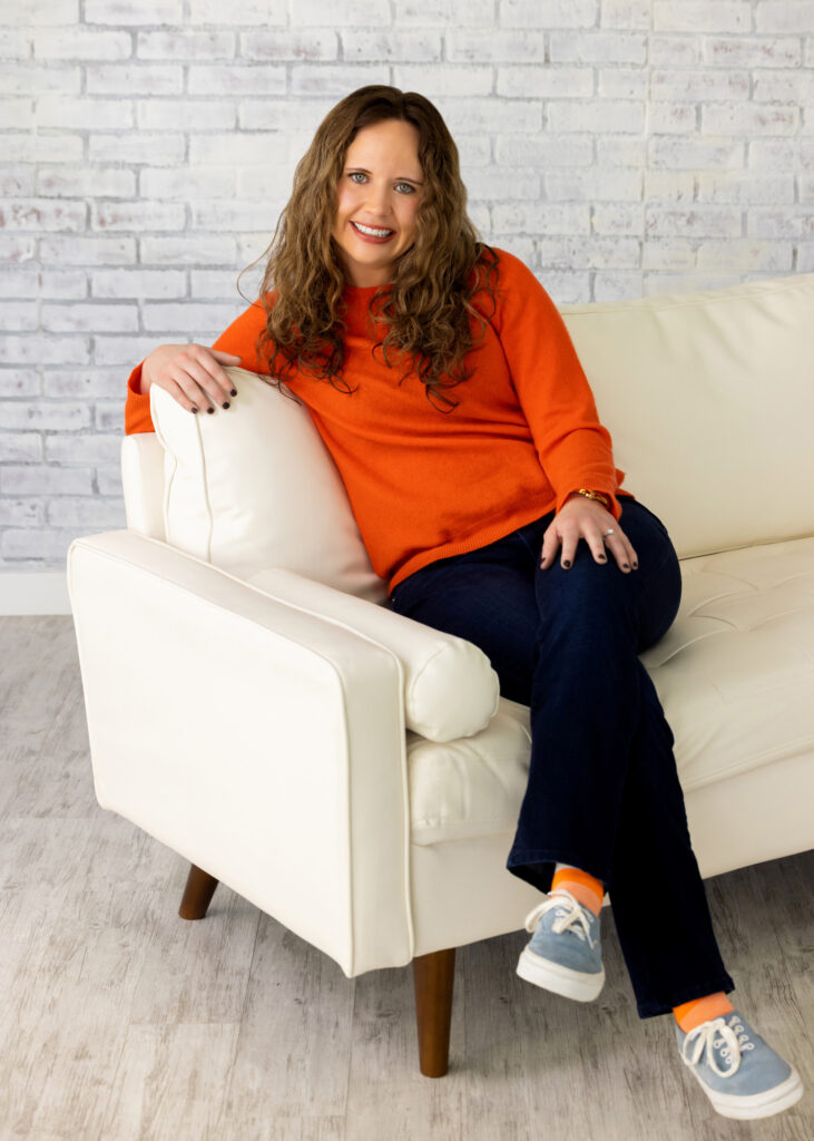 image of therapist sitting on couch to support a client